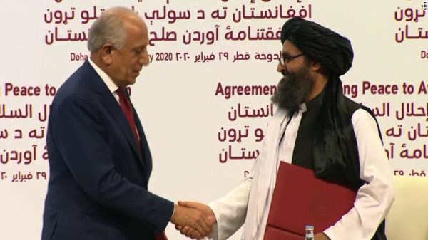 CNN-US.Envoy-Zalmay.Khalilzad-and-Taliban-Terrorists-HandShake-Doha-Qatar-Feb29-2020